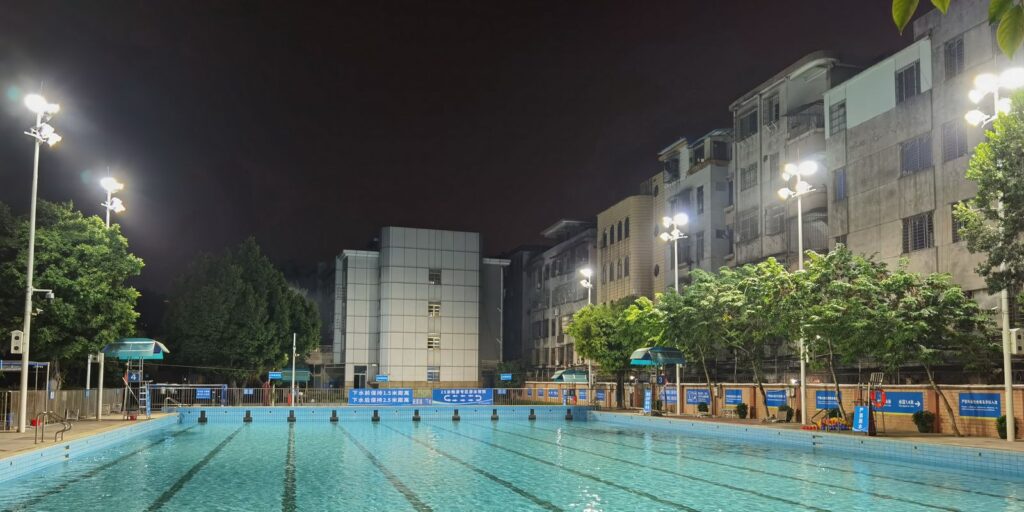 Swimming pool lighting is one of the most difficult among all the sports lighting solutions because of the high reflection of water and eye-contact with light when swimmers backstroke.